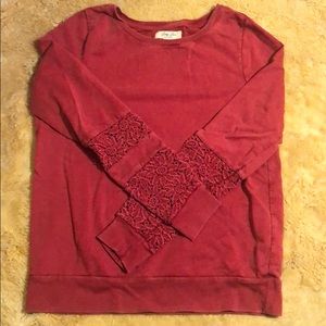 red crew neck sweater